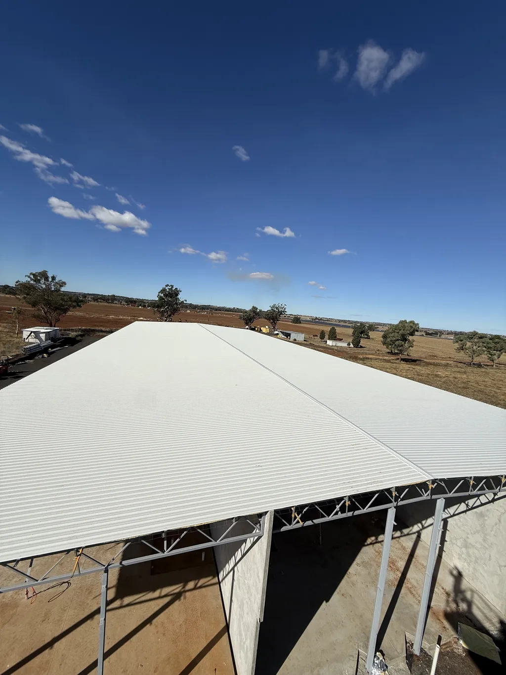 New metal roof installed on a home under construction